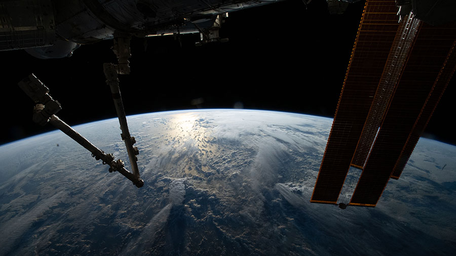 The sun's glint beams off the Indian Ocean in this photograph from the space station as it soared 260 miles above.