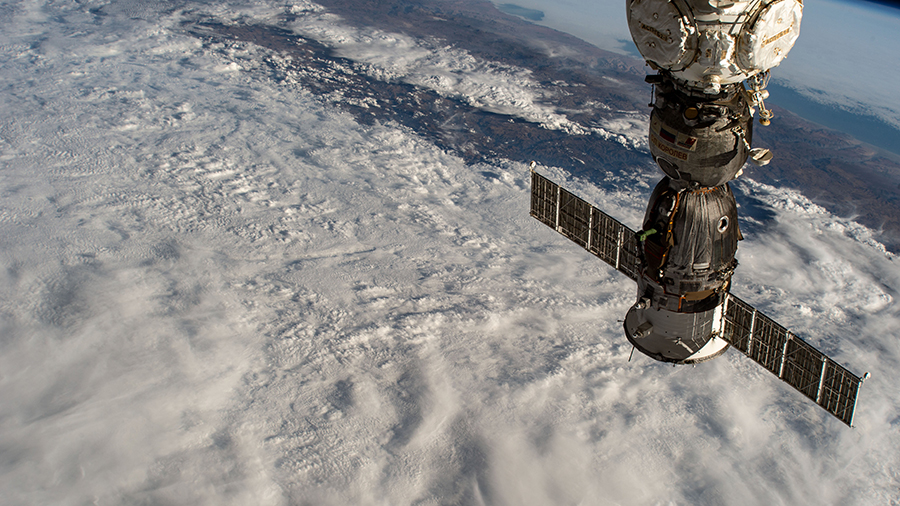 The Soyuz MS-21 crew ship that will return three Expedition 67 crew members to Earth this week is pictured docked to the Prichal module.