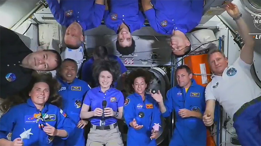 The four crew members from the SpaceX Crew-5 mission join the Expedition 68 crew during welcoming remarks inside the space station's Harmony module. Credit: NASA TV