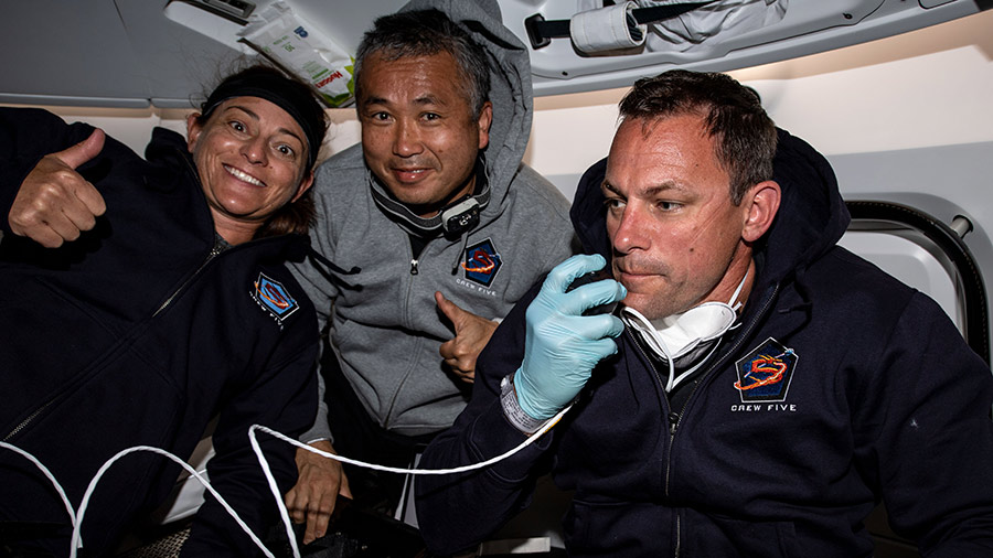 Astronaut (from left) Nicole Mann, Koichi Wakata, and Josh Cassada are pictured aboard the SpaceX Dragon Endurance crew ship during a flight to the space station on Oct. 2, 2022.