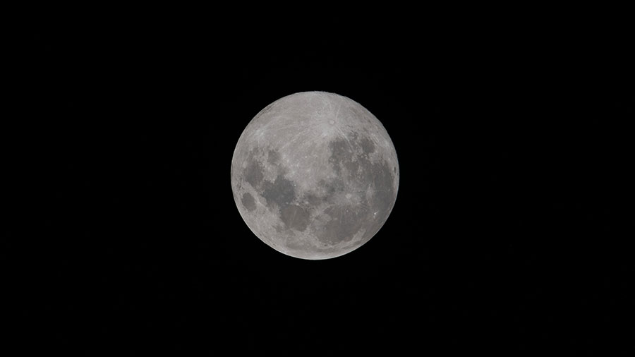 The Moon is pictured the day before its Full Moon phase from the space station. At the time of this photograph the Orion vehicle on the Artemis I mission was 234,100 miles from Earth and 127,700 miles from the Moon, cruising at 820 miles per hour.