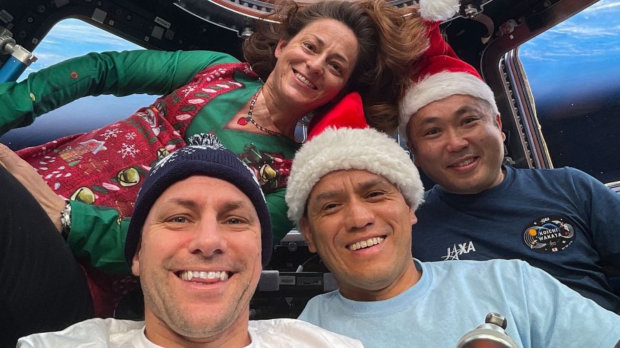 Expedition 68 Flight Engineers (from left) Josh Cassada, Nicole Mann, and Frank Rubio, all from NASA, and Koichi Wakata of the Japan Aerospace Exploration Agency (JAXA), pose for a festive portrait on Christmas Day inside the cupola as the International Space Station orbited 270 miles above the southern Atlantic Ocean on Dec. 25, 2022.