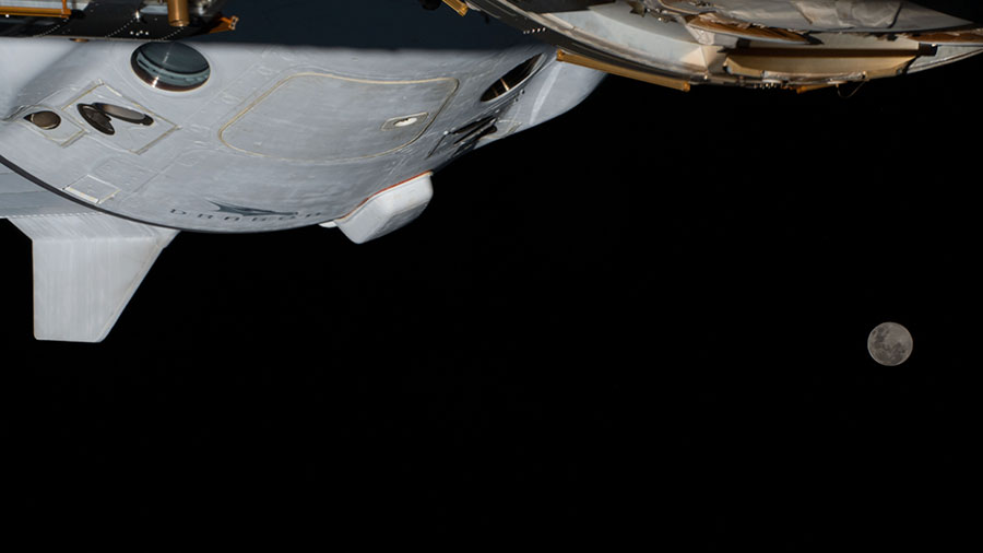 The Full Moon is pictured behind the SpaceX Dragon Endurance crew ship while the space station was orbiting above southern Brazil.