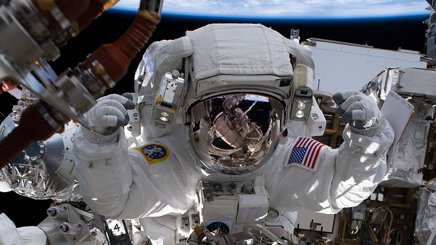 Astronaut Nicole Mann is pictured during her first spacewalk on Jan. 20, 2023, to prepare the orbiting lab for its next roll-out solar array.