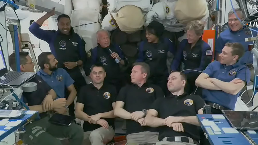 The four Axiom Mission-2 crew members join the seven-member Expedition 69 crew aboard the station and gather together for a crew greeting ceremony. Credit: NASA TV