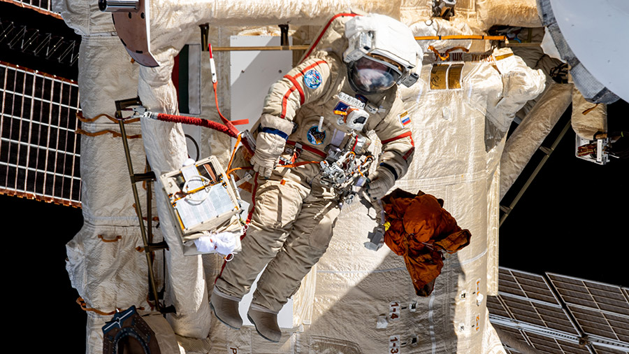 Roscosmos spacewalker Sergey Prokopyev works outside the space station to install an experiment airlock on the Nauka science module on May 3, 2023.