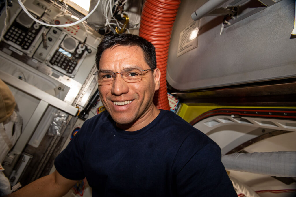 NASA astronaut and Expedition 69 Flight Engineer Frank Rubio is pictured working inside the International Space Station's Quest airlock.