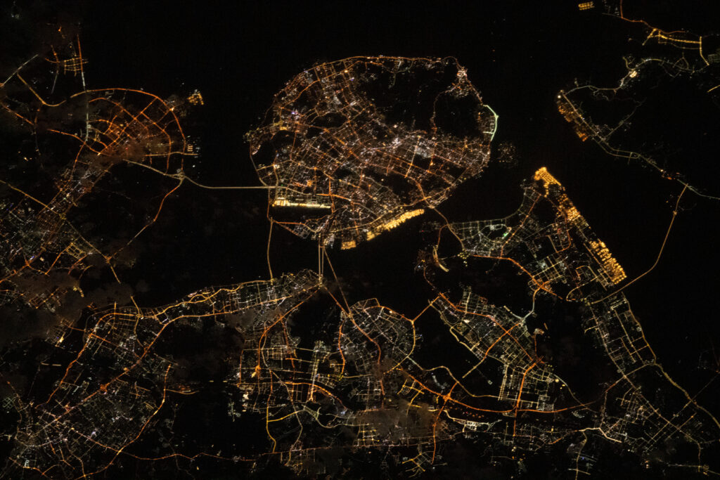 The southeast Chinese port city of Xiamen, on the coast of the South China Sea with a population of over 5.1 million people, is pictured from the International Space Station as it orbited 258 miles above during an orbital night pass.