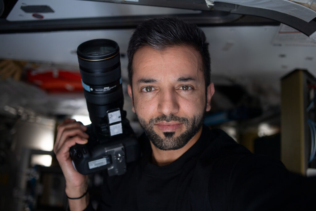 United Arab Emirates (UAE) Flight Engineer Sultan Alneyadi poses for a selfie while taking photos of Earth from the International Space Station.