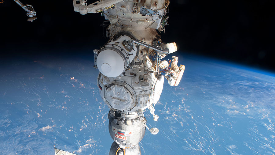 Cosmonauts Sergey Prokopyev and Dmitri Petelin are pictured during a spacewalk on May 12 to deploy and activate a radiator on the Nauka science module.