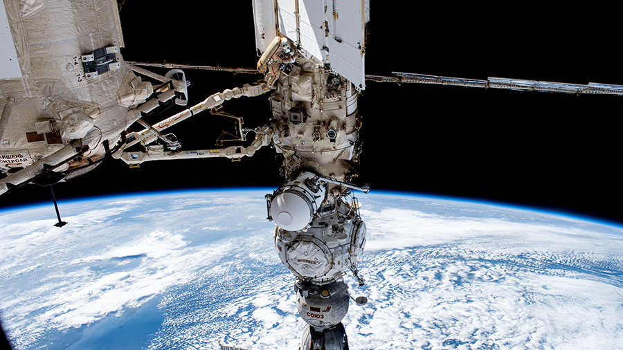 Cosmonaut Sergey Prokopyev (top) is pictured in his Orlan spacesuit during a six-hour and 35-minute spacewalk for upgrades on the International Space Station on Aug. 9, 2023.