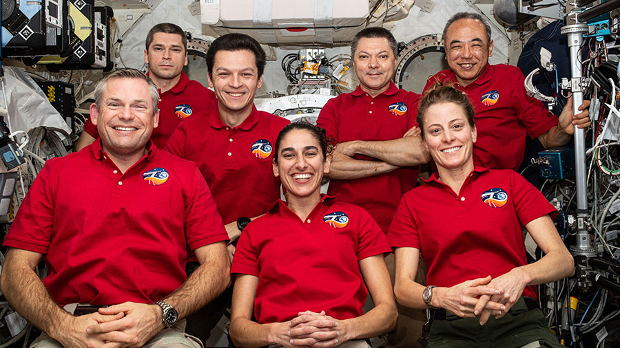 The seven-member Expedition 70 crew poses for a portrait inside the International Space Station's Kibo laboratory module. In the front row (from left) are, Commander Andreas Mogensen from ESA (European Space Agency) and NASA Flight Engineers Jasmin Moghbeli and Loral O'Hara. In the back are, Roscosmos Flight Engineers Nikolai Chub, Konstantin Borisov, and Oleg Kononenko; and JAXA (Japan Aerospace Exploration Agency) Flight Engineer Satoshi Furukawa.