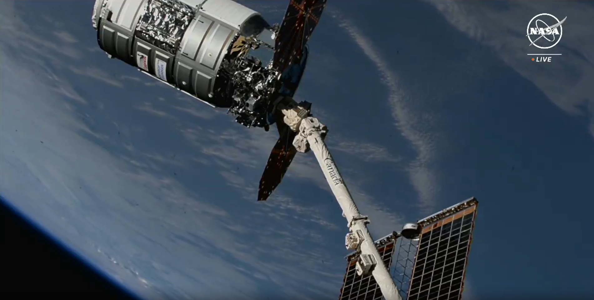 Northrop Grumman's Cygnus spacecraft is pictured attached to the Canadarm2 robotic arm, moments after NASA astronaut Matthew Dominick maneuvered the robotic arm to capture the spacecraft ahead of installation to the Earth-facing port of the Unity module. Credit: NASA TV