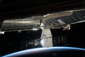 SpaceX's Dragon cargo capsule is seen here docked to the Earth facing port of the station's Harmony module on the company's sixth commercial resupply flight