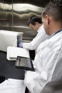 APEX-04, or Advanced Plant EXperiments-04, is being prepared in a cold room in the Kennedy Space Center Processing Facility for SpaceX-10. Eric Morris from the cold stowage group fits items into the Double Cold Bag (DCB) which is a non-powered container that keeps the APEX petri plates at +4 degrees Celsius during launch and ascent.. Dr. Anna Lisa Paul of the University of Florida is the principal investigator for APEX-04. Apex-04 is an experiment involving Arabidopsis in petri plates inside the Veggie facility aboard the International Space Station. Since Arabidopsis is the genetic model of the plant world, it is a perfect sample organism for performing genetic studies in spaceflight. The experiment is the result of a grant from NASA’s Space Life and Physical Sciences division.