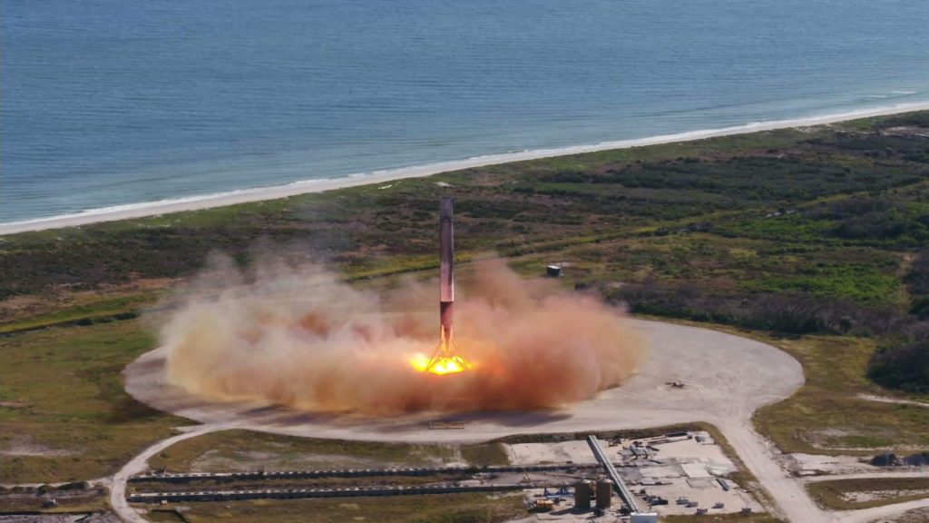 The SpaceX Falcon 9 first stage lands.