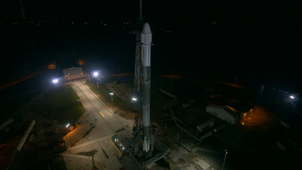 The SpaceX Falcon 9 rocket and Dragon spacecraft await liftoff from Space Launch Complex 40 at Cape Canaveral Air Force Station.