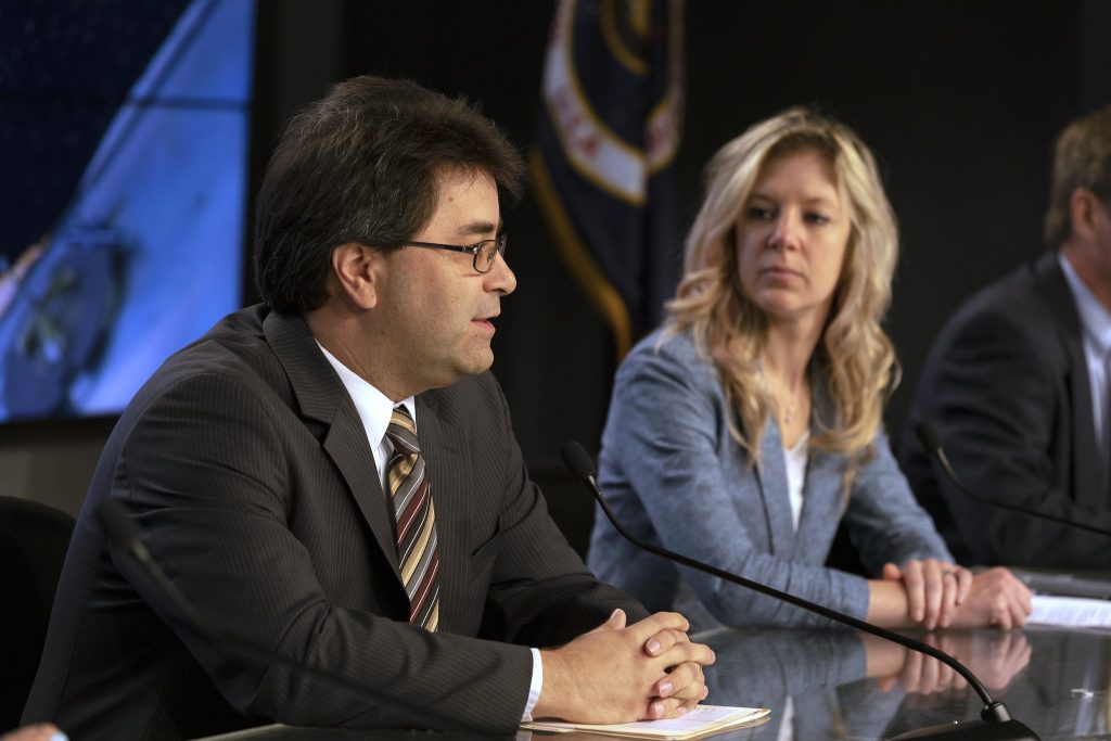 Bill Spetch, deputy manager of the International Space Station Transportation Integration Office at NASAs Johnson Space Center in Houston, speaks during the prelaunch news conference for SpaceX's 18th Commercial Resupply Services (CRS-18) mission to the station on July 24, 2019, at the agency's Kennedy Space Center in Florida. At right is Jessica Jensen, director of Dragon mission management at SpaceX. 