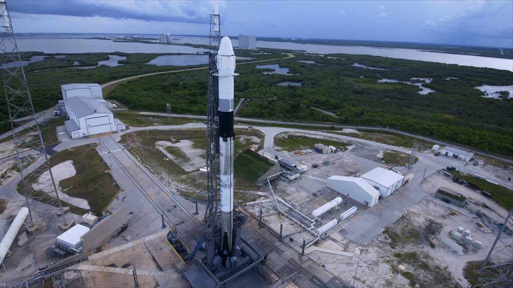 SpaceX's Falcon 9 rocket stands ready for lift off at Cape Canaveral Air Force Station's Space Launch Complex 40 in Florida for the company's 18th Commercial Resupply Services (CRS-18) mission to the International Space Station. Launch is scheduled for 6:24 p.m. EDT.