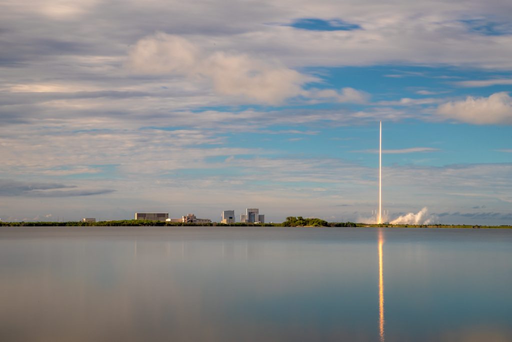 A SpaceX Falcon 9 rocket soars upward after its liftoff from Space Launch Complex 40 at Cape Canaveral Air Force Station in Florida at 6:01 p.m. EDT on July 25, 2019, carrying the Dragon spacecraft on the company's 18th Commercial Resupply Services (CRS-18) mission to the International Space Station.