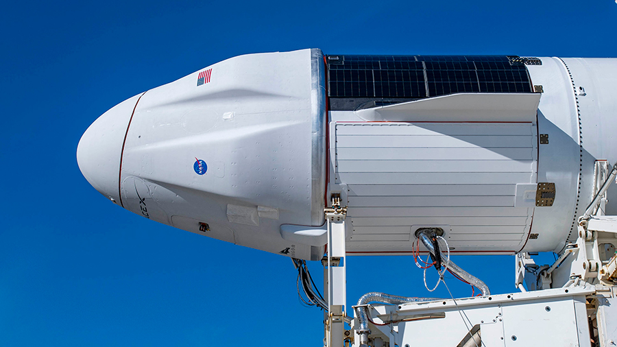 The upgraded version of SpaceX’s Cargo Dragon spacecraft is seen before it rolls out to the launch pad at Kennedy Space Center in Florida.