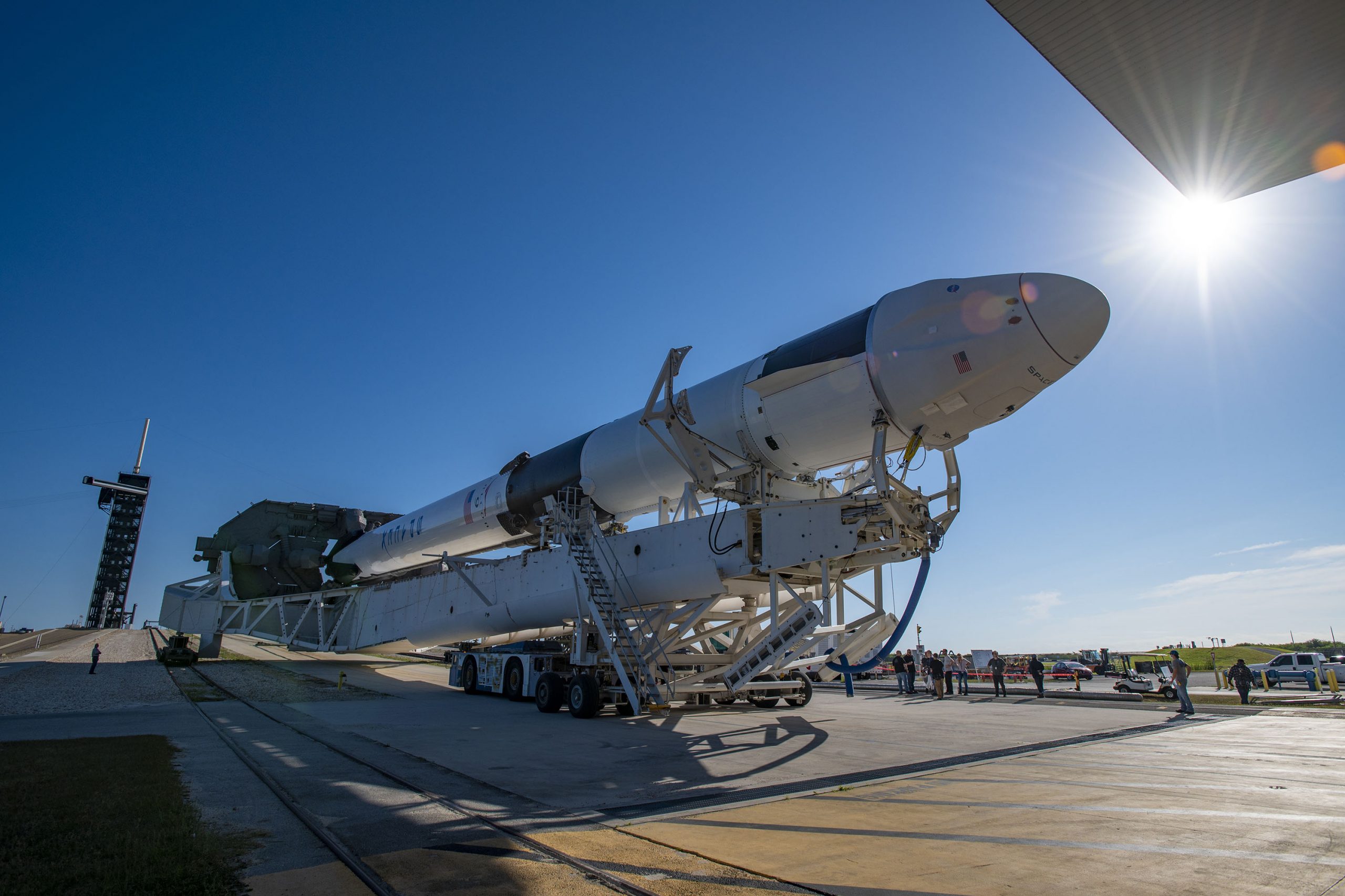 The SpaceX Falcon 9 rocket and Dragon spacecraft are rolled out to the launch pad in preparation for the CRS-22 mission.