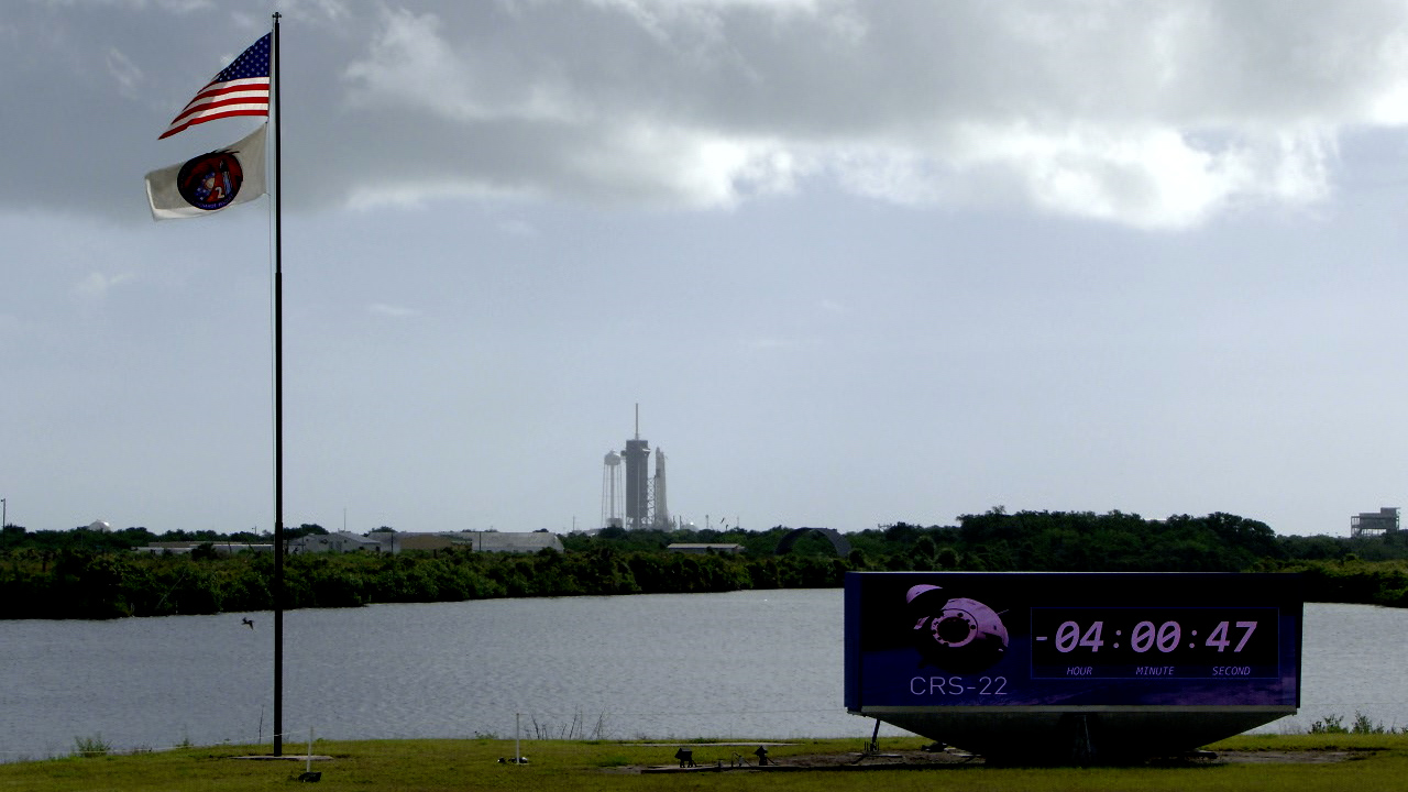 The SpaceX Falcon 9 rocket and Dragon spacecraft stand ready for liftoff on June 3, 2021, for the CRS-22 mission.