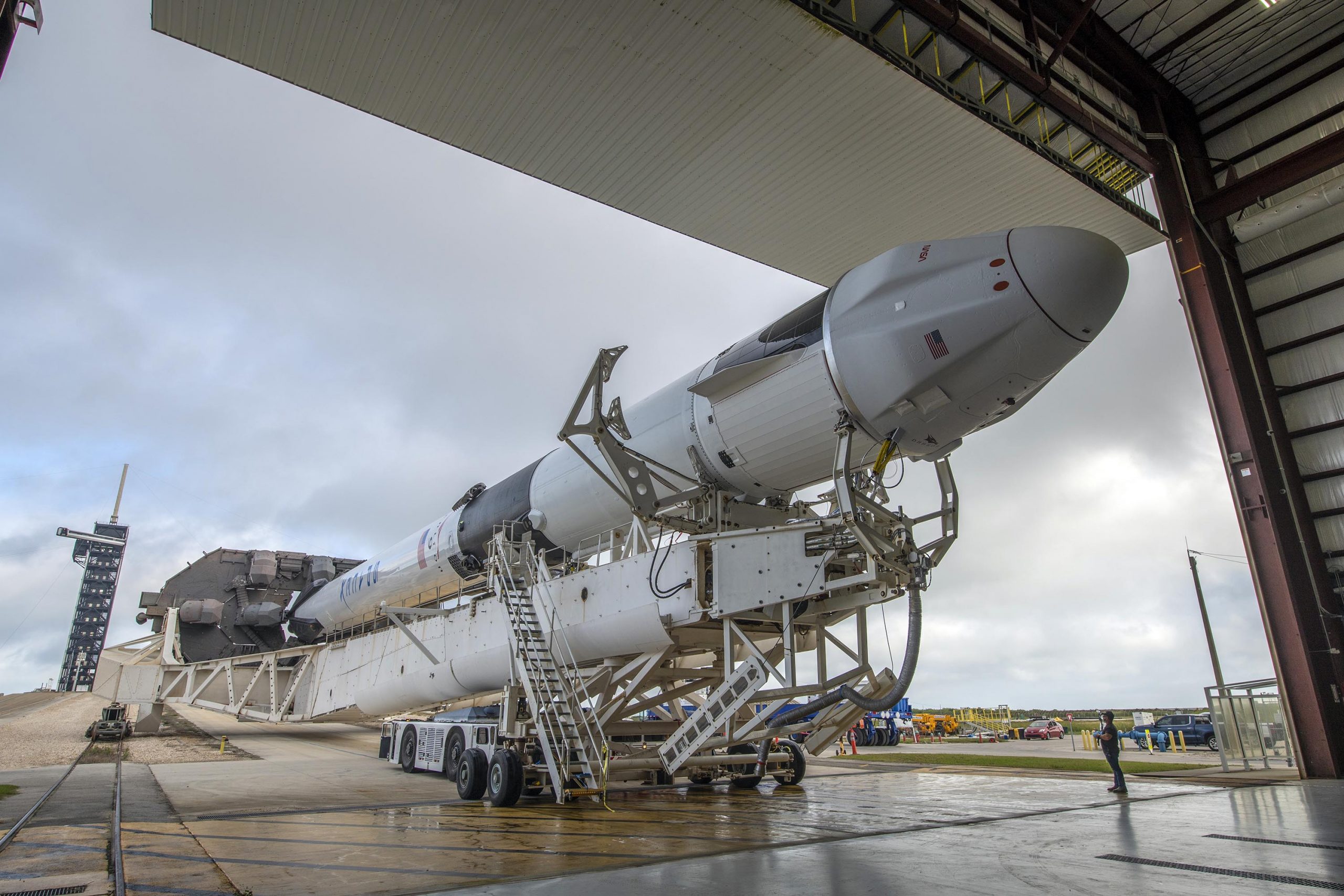 SpaceX's Falcon 9 rocket with Dragon spacecraft rolls out to Launch Complex 39A at NASA's Kennedy Space Center in Florida on Dec. 19, 2021, in preparation for launch. The agency's 24th commercial resupply services mission, targeted for liftoff on Dec. 21, 2021 at 5:06 a.m. EST, will deliver new science investigations, supplies, and equipment to the crew on board the International Space Station.