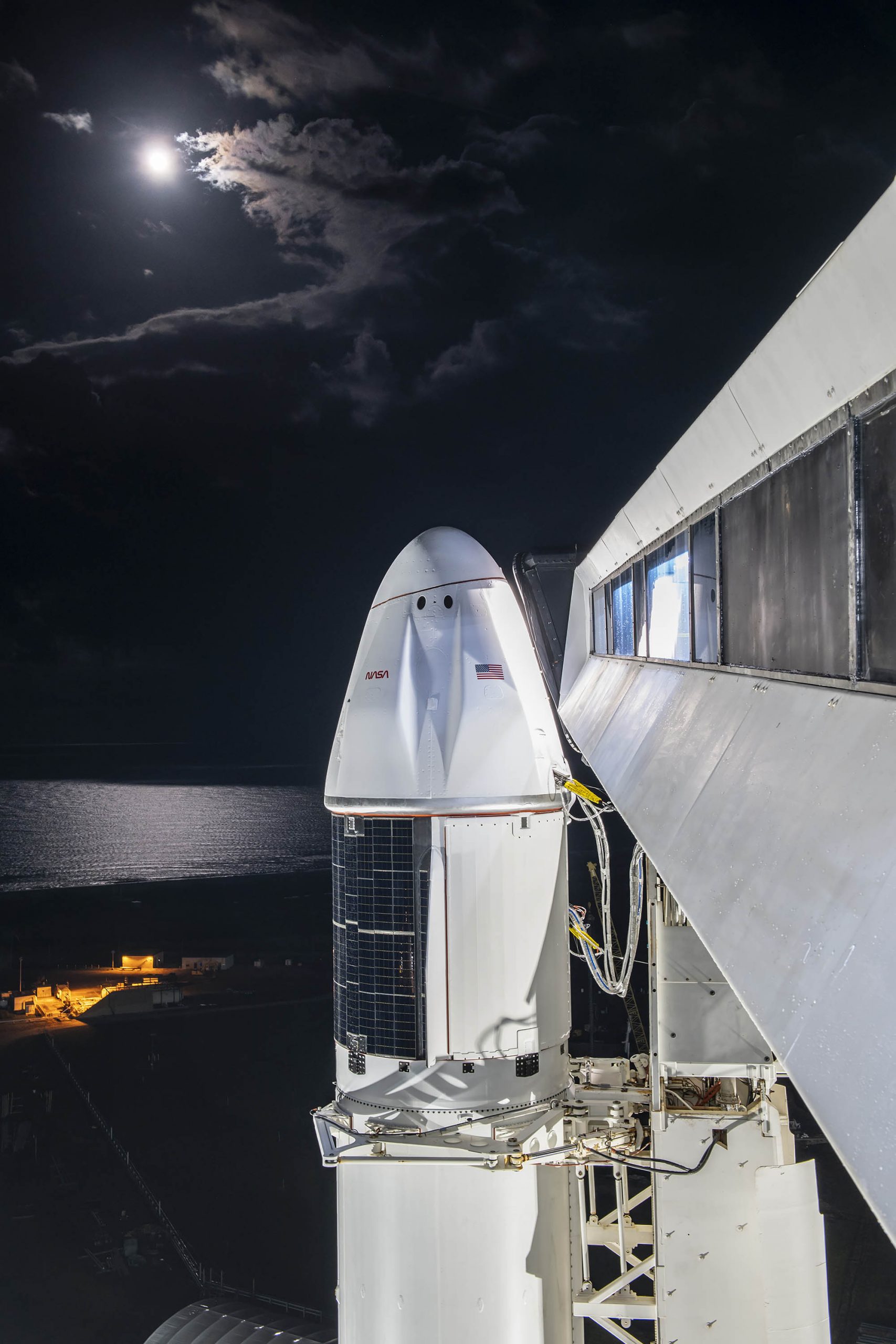 An up-close view of the Dragon spacecraft atop SpaceX’s Falcon 9 rocket at Kennedy Space Center’s Launch Complex 39A in Florida ahead of the company’s 24th commercial resupply services launch to the International Space Station. Photo credit: SpaceX