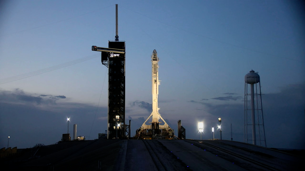 SpaceX’s Falcon 9 rocket and cargo Dragon spacecraft stand ready for launch at NASA Kennedy Space Center’s Launch Complex 39A in Florida on July 14, 2022, ahead of the company’s 25th commercial resupply services mission to the International Space Station.