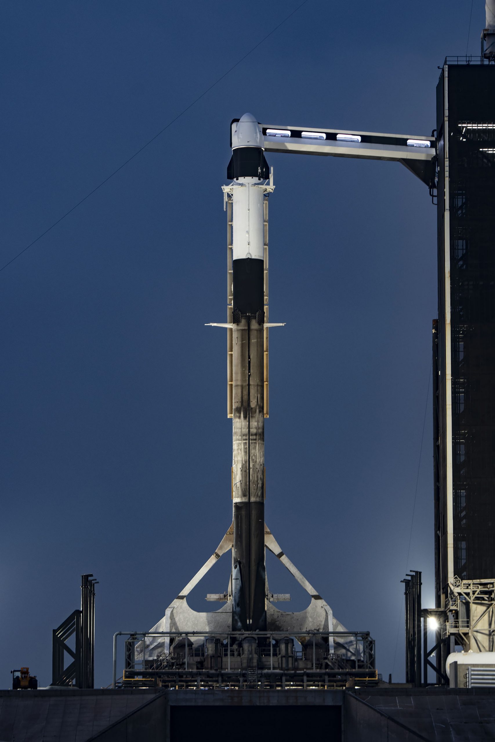 SpaceX's Falcon 9 rocket and Dragon spacecraft atop stand ready for liftoff at Kennedy Space Center's Launch Complex 39A in Florida ahead of the company's 27th resupply services mission to the International Space Station.