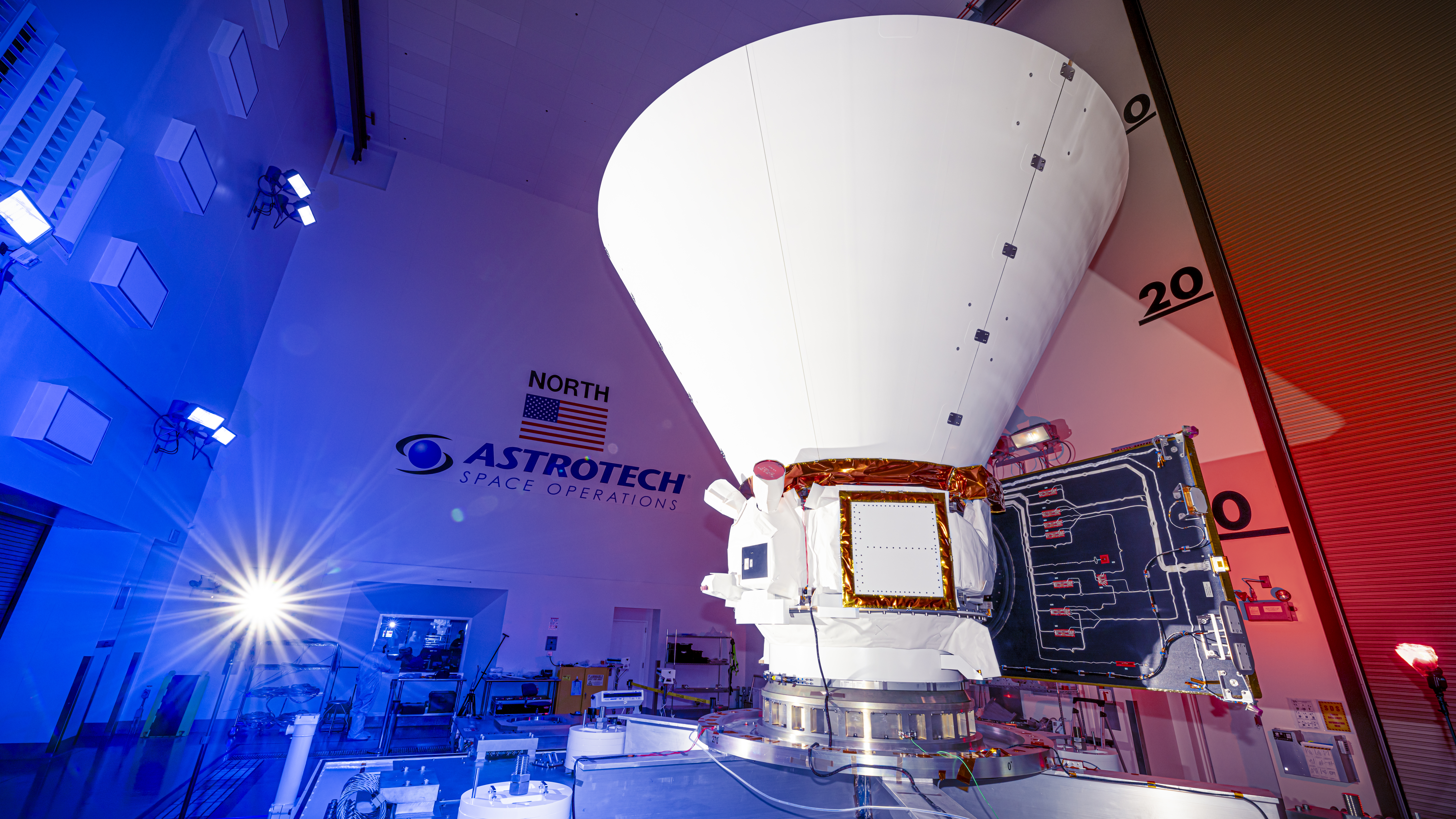 NASA’s SPHEREx (Spectro-Photometer for the History of the Universe, Epoch of Reionization and Ices Explorer), a space telescope, is situated on a work stand ahead of prelaunch operations at the Astrotech Processing Facility at Vandenberg Space Force Base in California on Thursday, Jan. 16, 2025. SPHEREx will enter a polar orbit around Earth and create a 3D map of the entire sky, gathering information about millions of galaxies for scientists to study what happened after the big bang, the history of galaxy evolution, and the origins of water in planetary systems in our galaxy.