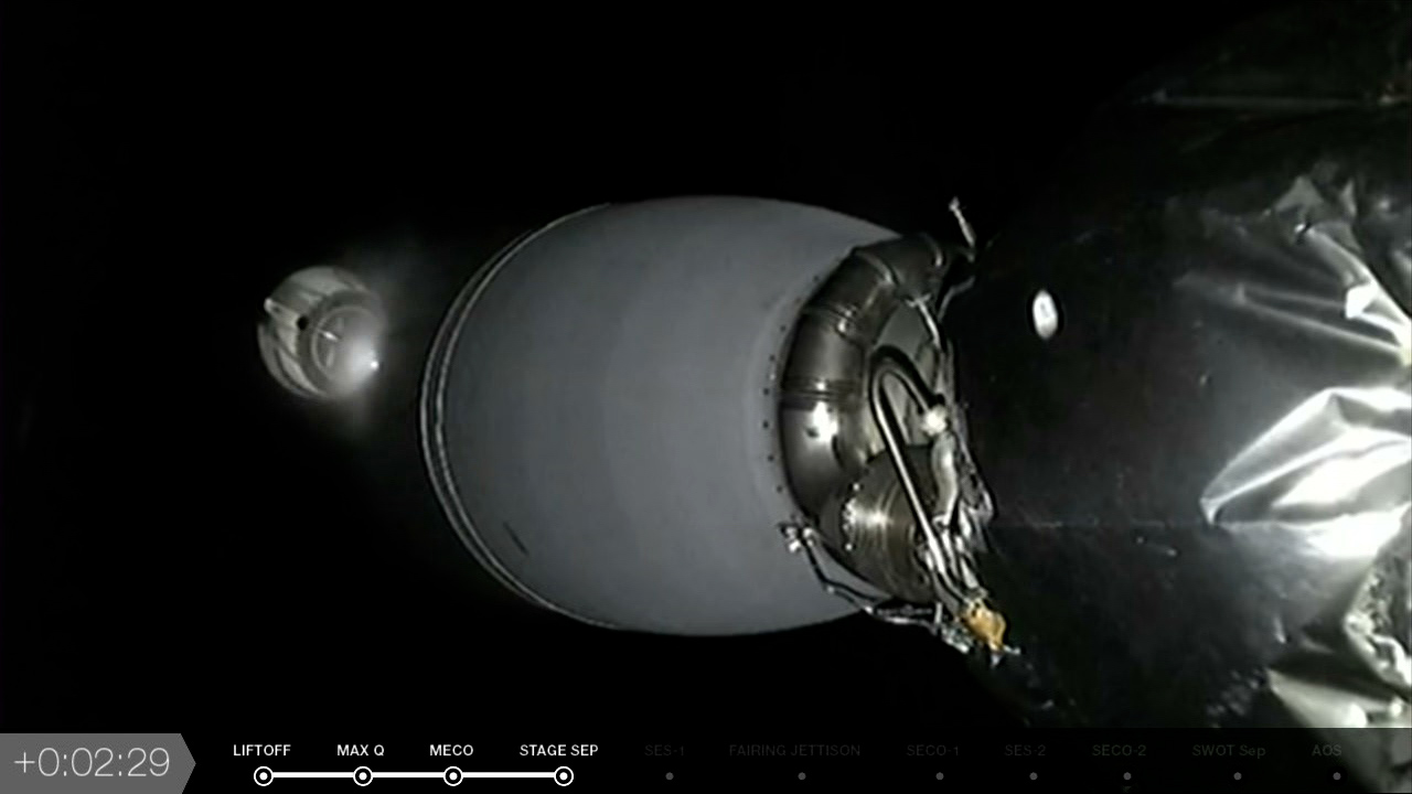 The SpaceX Falcon 9 rocket's first stage separates from the second stage.