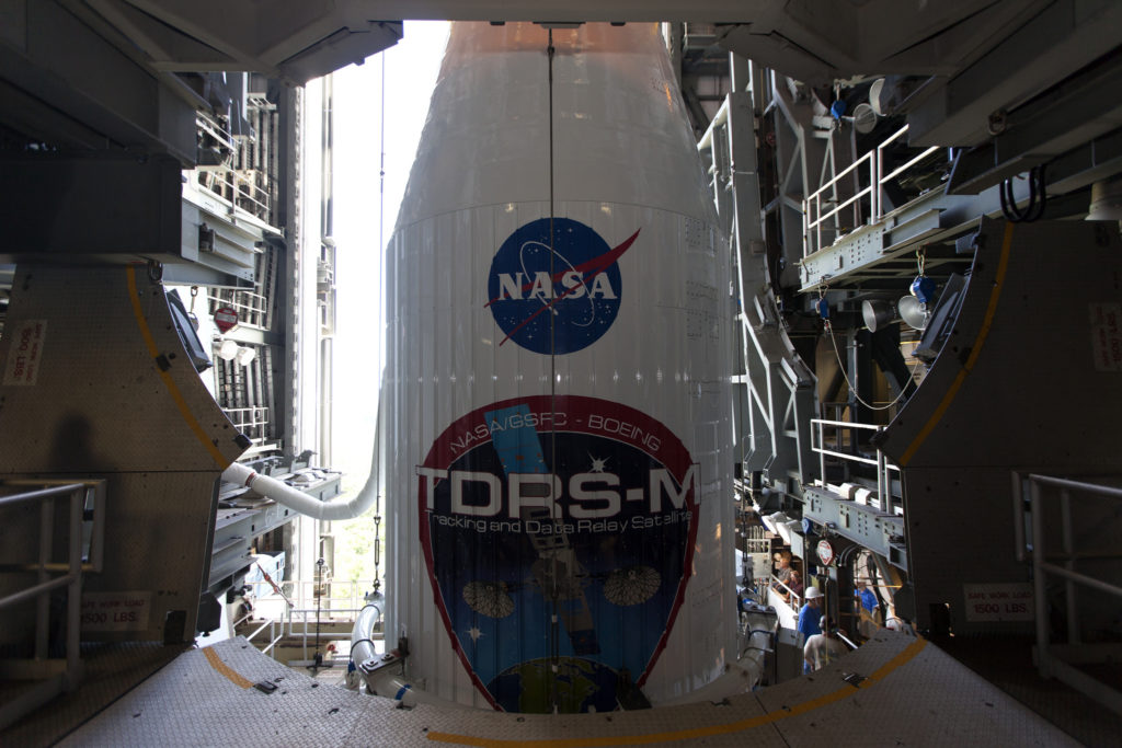 The payload fairing containing the Tracking and Data Relay Satellite-M (TDRS-M) is in place atop a United Launch Alliance Atlas V rocket at Cape Canaveral Air Force Station’s Space Launch Complex 41.