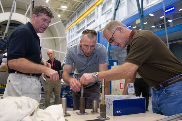 JSC2012-E-211701 -- NASA astronauts Steve Bowen, Andrew Feustel and David Wolf