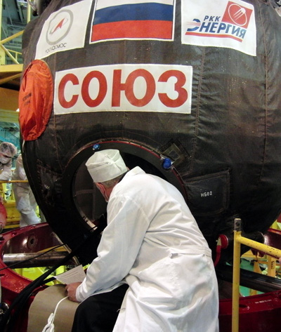 Doorway to space: Our Soyuz sits in an assembly stand, where we can go inside and check things out.