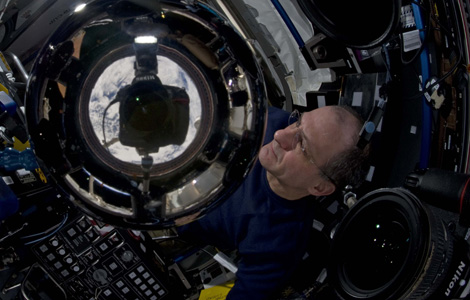 Self-portrait, with cameras.