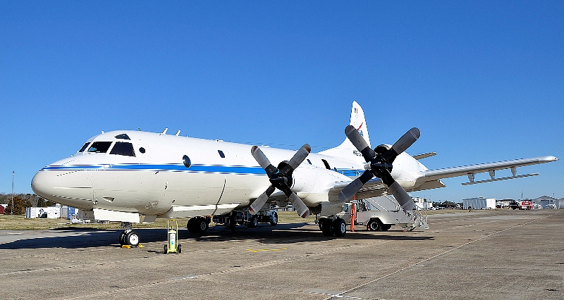 The P-3B on the ramp before a test flight. The antennas of the ice-penetrating radar system can be seen mounted under the wings.