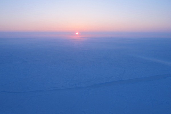 Sunrise over sea ice near the North Pole