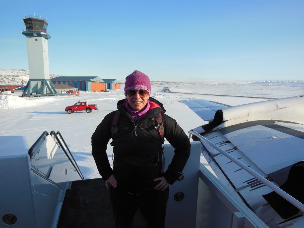 IceBridge project manager Christy Hansen on the stairway to NASA's P-3B.