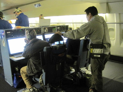 One of the passengers, a member of the DAOF staff, carrying his EPOS, the khaki-green pouch on a shoulder strap.