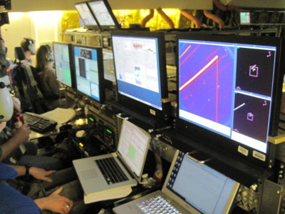 Image of the science instrument & telescope guide game consoles between flight legs.