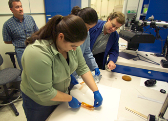 Torey Long and coworkers in the failure analysis lab